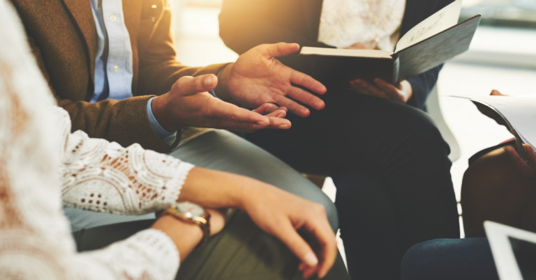 A group discussing in a circle